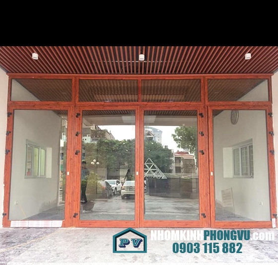 Mẫu cửa nhôm xingfa 4 cánh màu vân gỗ